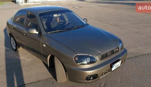 Бежевый Дэу Ланос, объемом двигателя 1.5 л и пробегом 298 тыс. км за 3300 $, фото 3 на Automoto.ua