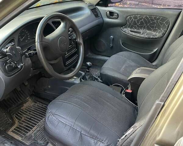 Бежевый Дэу Ланос, объемом двигателя 1.5 л и пробегом 260 тыс. км за 952 $, фото 13 на Automoto.ua