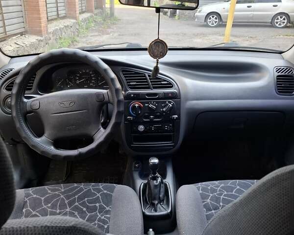 Бежевый Дэу Ланос, объемом двигателя 1.6 л и пробегом 256 тыс. км за 3000 $, фото 4 на Automoto.ua