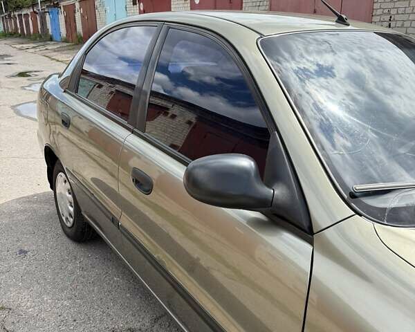 Дэу Ланос 2003 в Чернигове на Automoto.ua Бежевый Дэу Ланос, объемом двигателя 1.5 л и пробегом 236 тыс. км за 3700 $, фото 4 на Automoto.ua