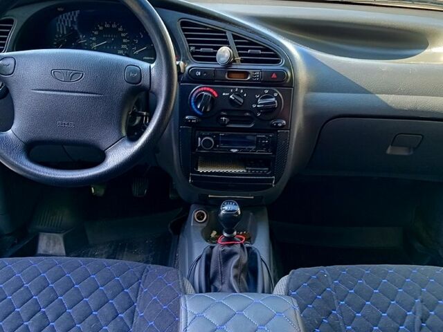 Бежевий Деу Ланос, об'ємом двигуна 1.5 л та пробігом 309 тис. км за 2600 $, фото 6 на Automoto.ua