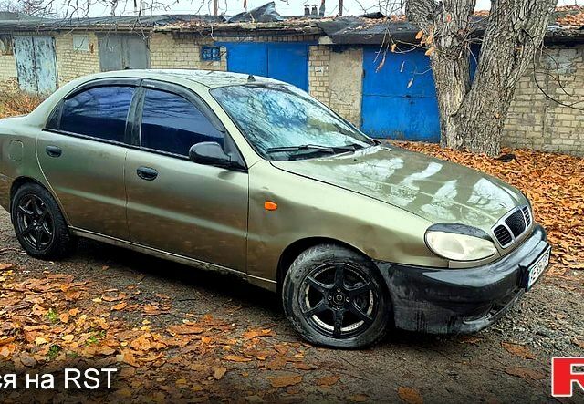 Бежевый Дэу Ланос, объемом двигателя 1.6 л и пробегом 353 тыс. км за 1000 $, фото 1 на Automoto.ua