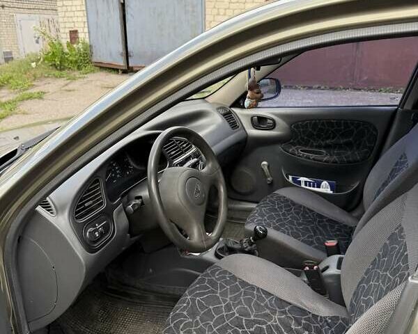 Дэу Ланос 2003 в Чернигове на Automoto.ua Бежевый Дэу Ланос, объемом двигателя 1.5 л и пробегом 236 тыс. км за 3700 $, фото 6 на Automoto.ua