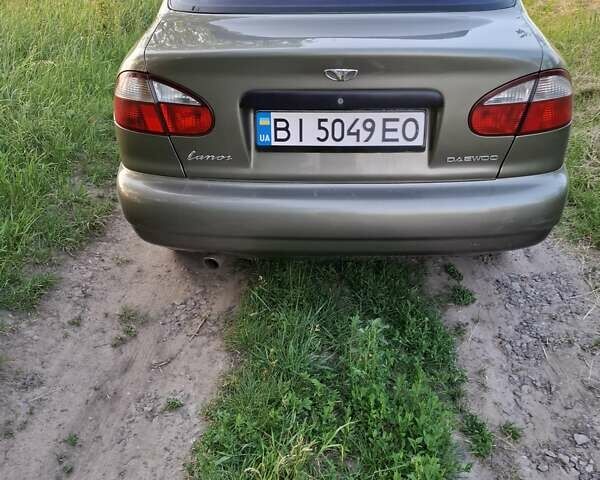 Бежевый Дэу Ланос, объемом двигателя 1.6 л и пробегом 256 тыс. км за 3000 $, фото 3 на Automoto.ua