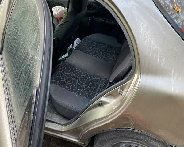 Бежевый Дэу Ланос, объемом двигателя 1.5 л и пробегом 260 тыс. км за 952 $, фото 11 на Automoto.ua