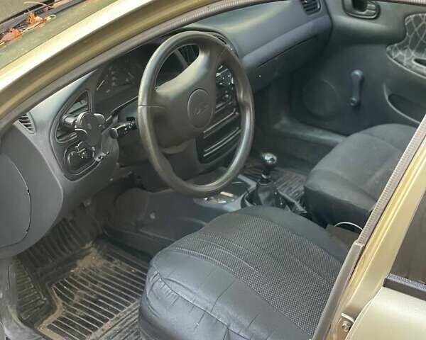 Бежевый Дэу Ланос, объемом двигателя 1.5 л и пробегом 260 тыс. км за 952 $, фото 12 на Automoto.ua