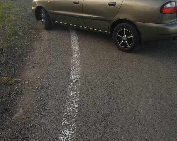 Бежевый Дэу Ланос, объемом двигателя 1.5 л и пробегом 281 тыс. км за 1500 $, фото 6 на Automoto.ua