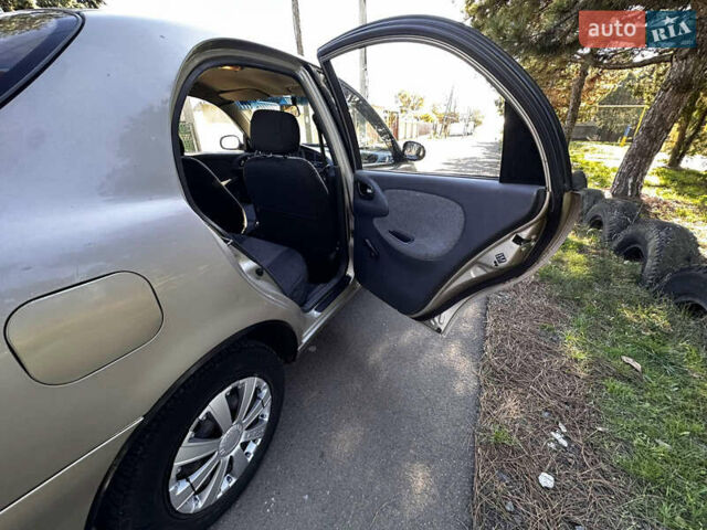 Бежевий Деу Ланос, об'ємом двигуна 1.5 л та пробігом 224 тис. км за 1650 $, фото 9 на Automoto.ua