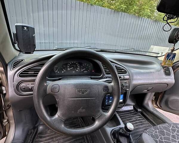 Бежевий Деу Ланос, об'ємом двигуна 1.6 л та пробігом 337 тис. км за 3200 $, фото 13 на Automoto.ua