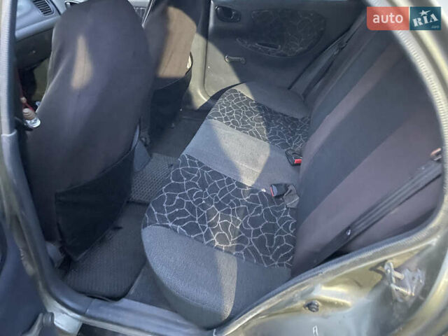 Бежевий Деу Ланос, об'ємом двигуна 1.6 л та пробігом 400 тис. км за 2150 $, фото 4 на Automoto.ua