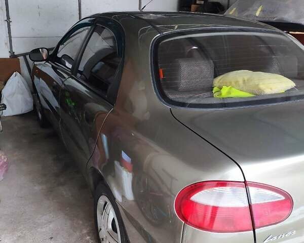 Бежевий Деу Ланос, об'ємом двигуна 1.5 л та пробігом 263 тис. км за 3000 $, фото 3 на Automoto.ua