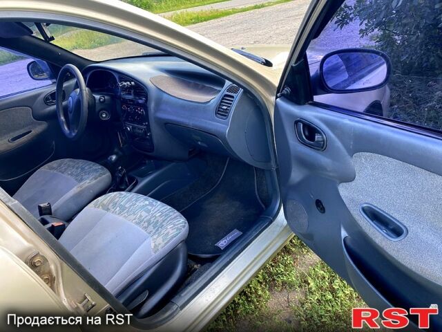 Бежевий Деу Ланос, об'ємом двигуна 1.5 л та пробігом 385 тис. км за 2300 $, фото 4 на Automoto.ua