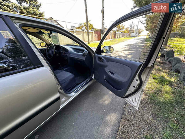 Бежевий Деу Ланос, об'ємом двигуна 1.5 л та пробігом 224 тис. км за 1650 $, фото 6 на Automoto.ua