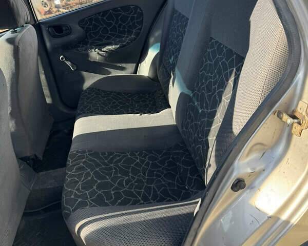 Бежевый Дэу Ланос, объемом двигателя 1.5 л и пробегом 250 тыс. км за 950 $, фото 13 на Automoto.ua