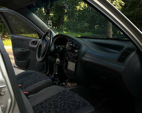 Бежевый Дэу Ланос, объемом двигателя 1.5 л и пробегом 225 тыс. км за 3200 $, фото 6 на Automoto.ua