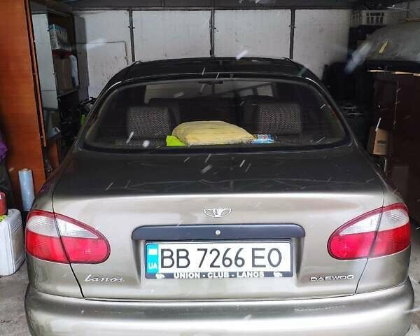 Бежевий Деу Ланос, об'ємом двигуна 1.5 л та пробігом 263 тис. км за 3000 $, фото 4 на Automoto.ua