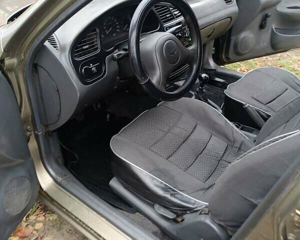Бежевый Дэу Ланос, объемом двигателя 0 л и пробегом 250 тыс. км за 1600 $, фото 7 на Automoto.ua