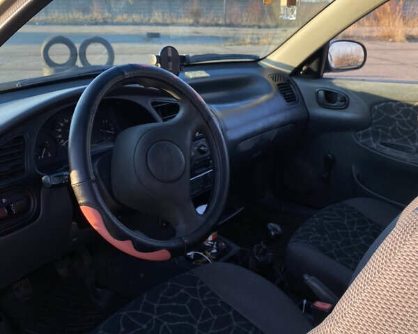 Бежевый Дэу Ланос, объемом двигателя 1.5 л и пробегом 265 тыс. км за 2200 $, фото 1 на Automoto.ua