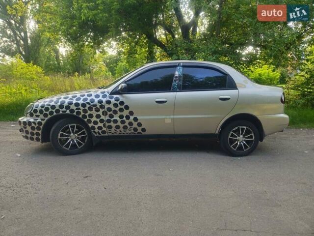Бежевий Деу Ланос, об'ємом двигуна 1.5 л та пробігом 195 тис. км за 2550 $, фото 1 на Automoto.ua