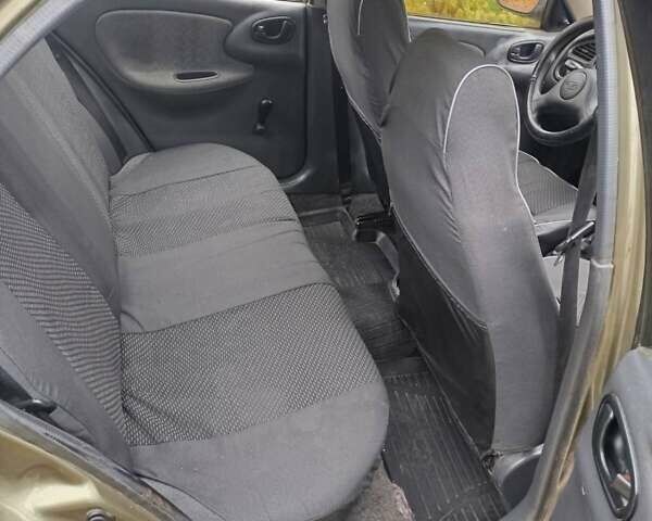 Бежевый Дэу Ланос, объемом двигателя 0 л и пробегом 250 тыс. км за 1600 $, фото 6 на Automoto.ua