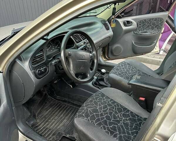 Бежевий Деу Ланос, об'ємом двигуна 1.6 л та пробігом 337 тис. км за 3200 $, фото 12 на Automoto.ua