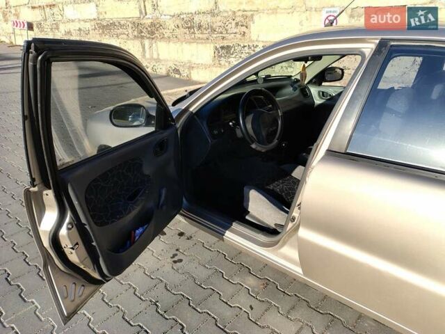 Бежевый Дэу Ланос, объемом двигателя 1.5 л и пробегом 353 тыс. км за 1700 $, фото 6 на Automoto.ua