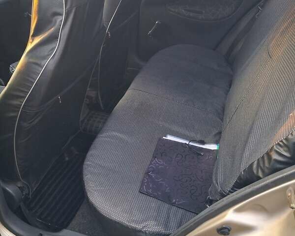 Бежевый Дэу Ланос, объемом двигателя 1.3 л и пробегом 170 тыс. км за 2200 $, фото 7 на Automoto.ua