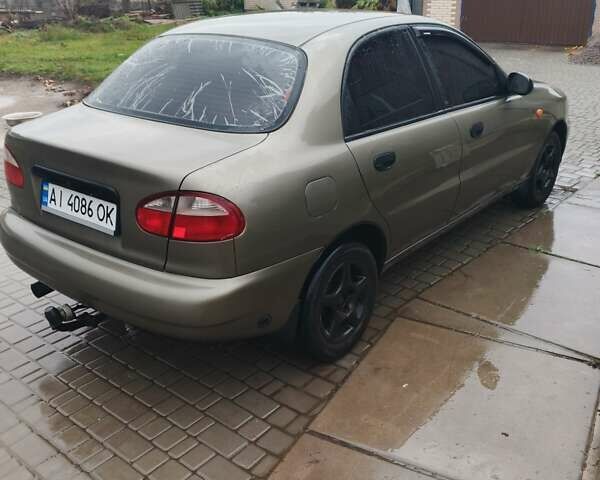 Бежевый Дэу Ланос, объемом двигателя 1.5 л и пробегом 286 тыс. км за 2100 $, фото 1 на Automoto.ua