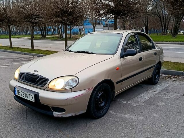 Бежевый Дэу Ланос, объемом двигателя 1.3 л и пробегом 230 тыс. км за 1600 $, фото 2 на Automoto.ua