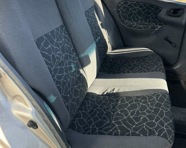 Бежевый Дэу Ланос, объемом двигателя 1.5 л и пробегом 250 тыс. км за 950 $, фото 12 на Automoto.ua