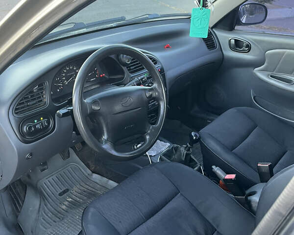 Бежевий Деу Ланос, об'ємом двигуна 1.5 л та пробігом 250 тис. км за 3300 $, фото 13 на Automoto.ua