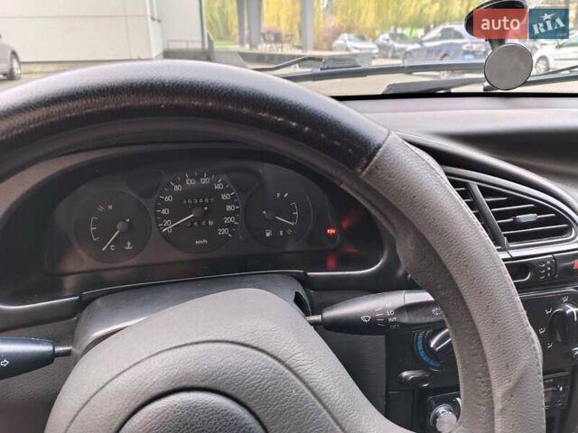 Бежевый Дэу Ланос, объемом двигателя 1.5 л и пробегом 353 тыс. км за 1700 $, фото 10 на Automoto.ua