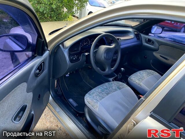 Бежевий Деу Ланос, об'ємом двигуна 1.5 л та пробігом 385 тис. км за 2300 $, фото 5 на Automoto.ua