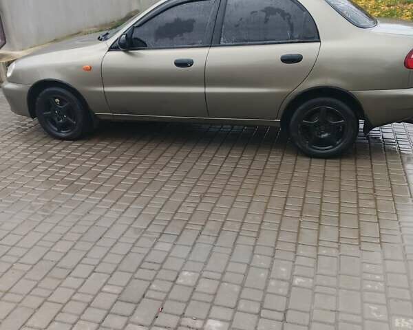 Бежевый Дэу Ланос, объемом двигателя 1.5 л и пробегом 286 тыс. км за 2100 $, фото 3 на Automoto.ua