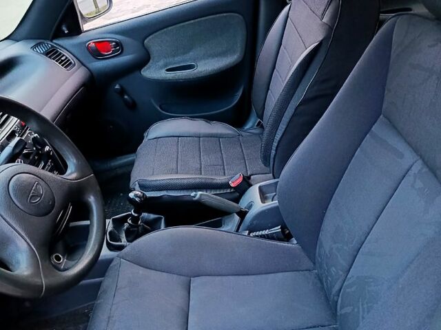 Бежевый Дэу Ланос, объемом двигателя 1.3 л и пробегом 230 тыс. км за 1600 $, фото 4 на Automoto.ua