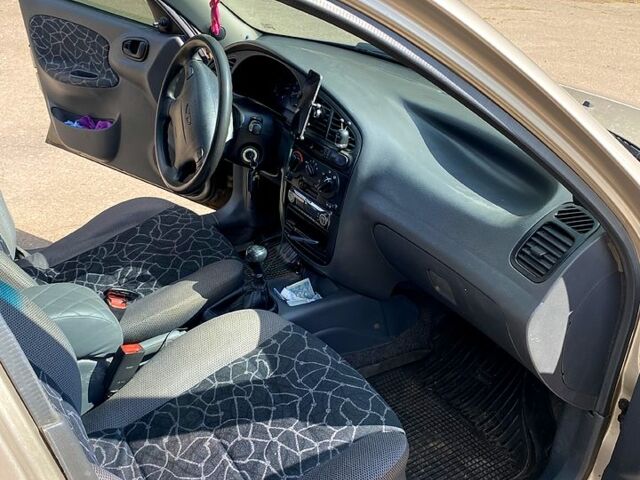 Бежевий Деу Ланос, об'ємом двигуна 1.6 л та пробігом 130 тис. км за 3300 $, фото 7 на Automoto.ua