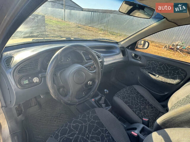 Бежевый Дэу Ланос, объемом двигателя 1.5 л и пробегом 250 тыс. км за 950 $, фото 8 на Automoto.ua