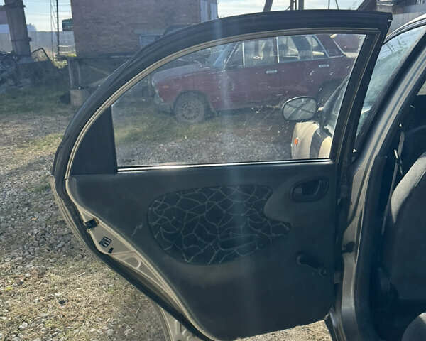 Бежевый Дэу Ланос, объемом двигателя 1.5 л и пробегом 250 тыс. км за 950 $, фото 14 на Automoto.ua