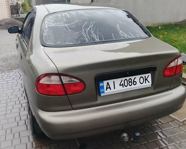 Бежевый Дэу Ланос, объемом двигателя 1.5 л и пробегом 286 тыс. км за 2100 $, фото 2 на Automoto.ua