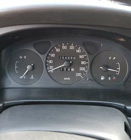 Бежевий Деу Ланос, об'ємом двигуна 1.5 л та пробігом 254 тис. км за 2200 $, фото 7 на Automoto.ua