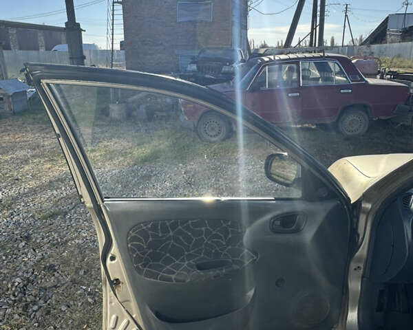 Бежевый Дэу Ланос, объемом двигателя 1.5 л и пробегом 250 тыс. км за 950 $, фото 9 на Automoto.ua