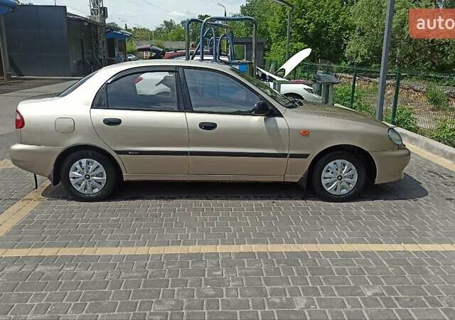 Бежевий Деу Ланос, об'ємом двигуна 1.5 л та пробігом 211 тис. км за 2650 $, фото 1 на Automoto.ua