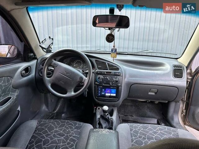 Бежевий Деу Ланос, об'ємом двигуна 1.6 л та пробігом 337 тис. км за 3200 $, фото 11 на Automoto.ua