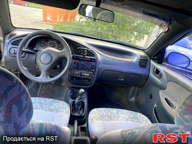 Бежевий Деу Ланос, об'ємом двигуна 1.5 л та пробігом 385 тис. км за 2300 $, фото 6 на Automoto.ua