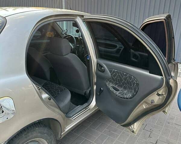 Бежевий Деу Ланос, об'ємом двигуна 1.6 л та пробігом 337 тис. км за 3200 $, фото 9 на Automoto.ua