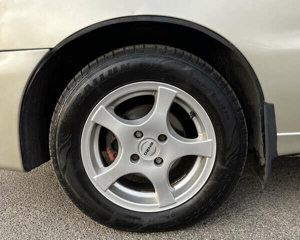 Бежевый Дэу Ланос, объемом двигателя 1.5 л и пробегом 350 тыс. км за 2700 $, фото 13 на Automoto.ua