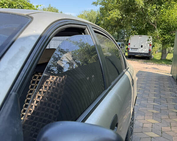 Бежевый Дэу Ланос, объемом двигателя 1.3 л и пробегом 380 тыс. км за 1800 $, фото 6 на Automoto.ua