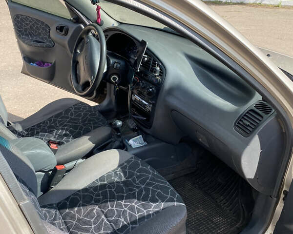 Бежевий Деу Ланос, об'ємом двигуна 1.6 л та пробігом 11 тис. км за 3300 $, фото 9 на Automoto.ua