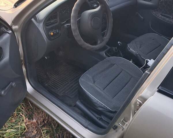 Бежевый Дэу Ланос, объемом двигателя 1.3 л и пробегом 170 тыс. км за 2200 $, фото 6 на Automoto.ua