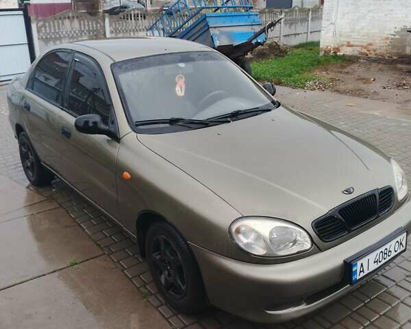 Бежевый Дэу Ланос, объемом двигателя 1.5 л и пробегом 286 тыс. км за 2100 $, фото 4 на Automoto.ua